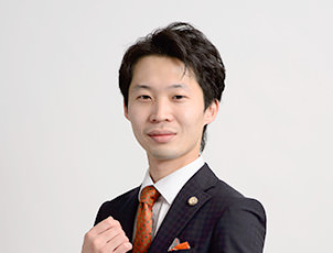 都築 絢一